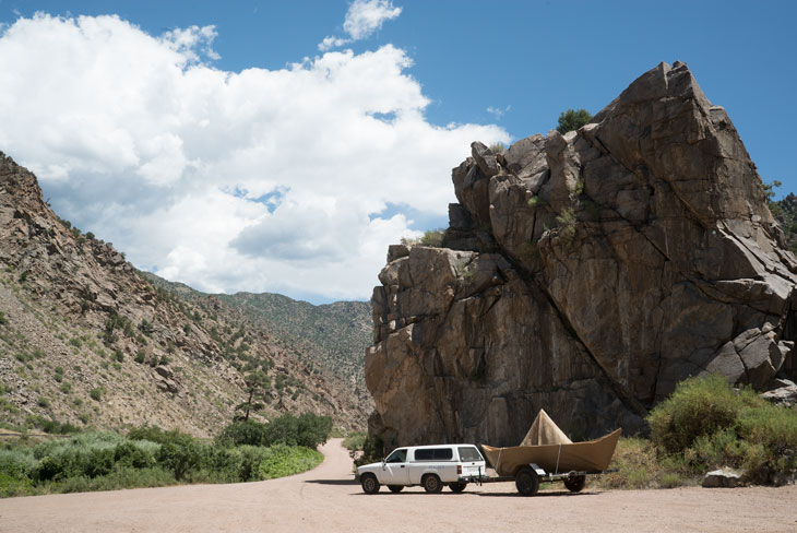 Boat by river canyon in Colorado