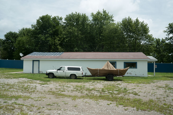 Boat with American flag roof in Illinois