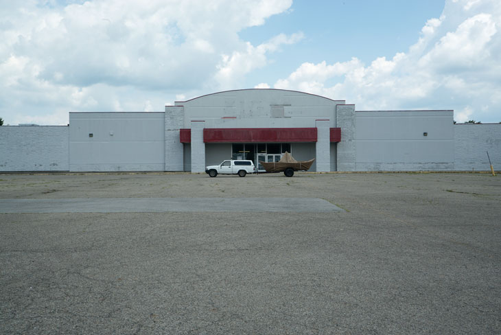 Boat with strip mall in Cornersville, Indiana