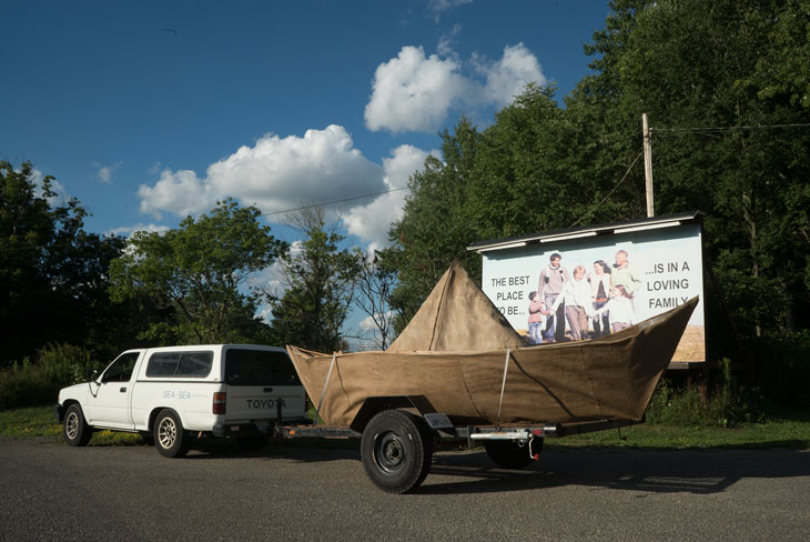 Boat with billboard near New York border in Pennsylvania